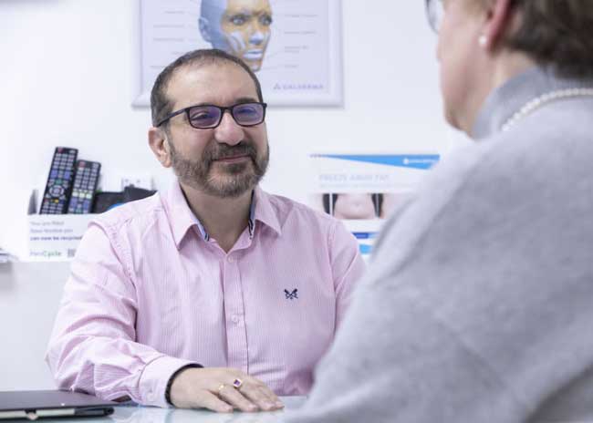 A private GP talking to a patient at VL Aesthetics Clinic in Carlisle (Cumbria)